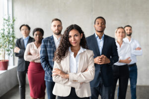 Successful Latin Businesswoman Standing In Front Of Business Tea